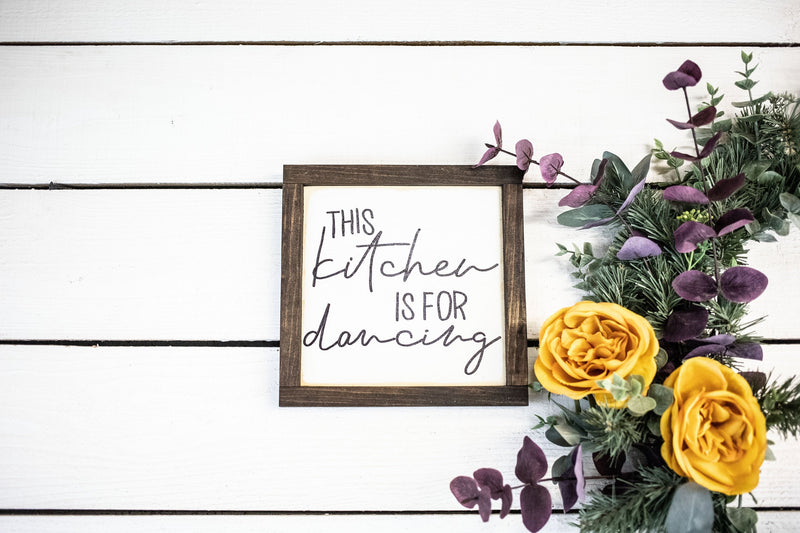 this kitchen is for dancing, wood sign